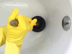 fixing a clogged tub