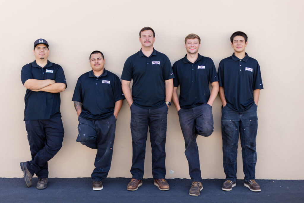 Voyager team of plumbers posing for team photo