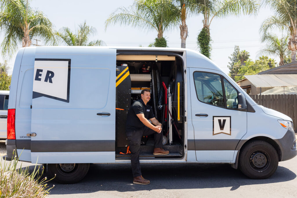 branded truck, open door, technician