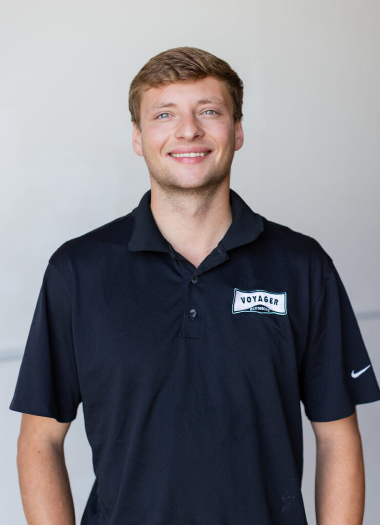 Voyager plumbing technician ready to service local homes 