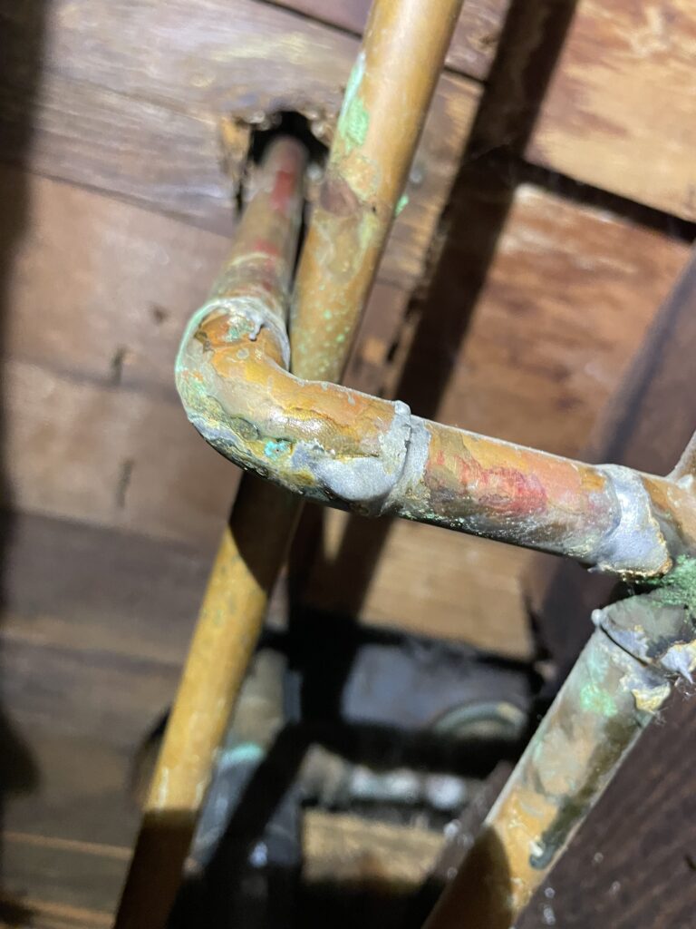 corroded copper pipe